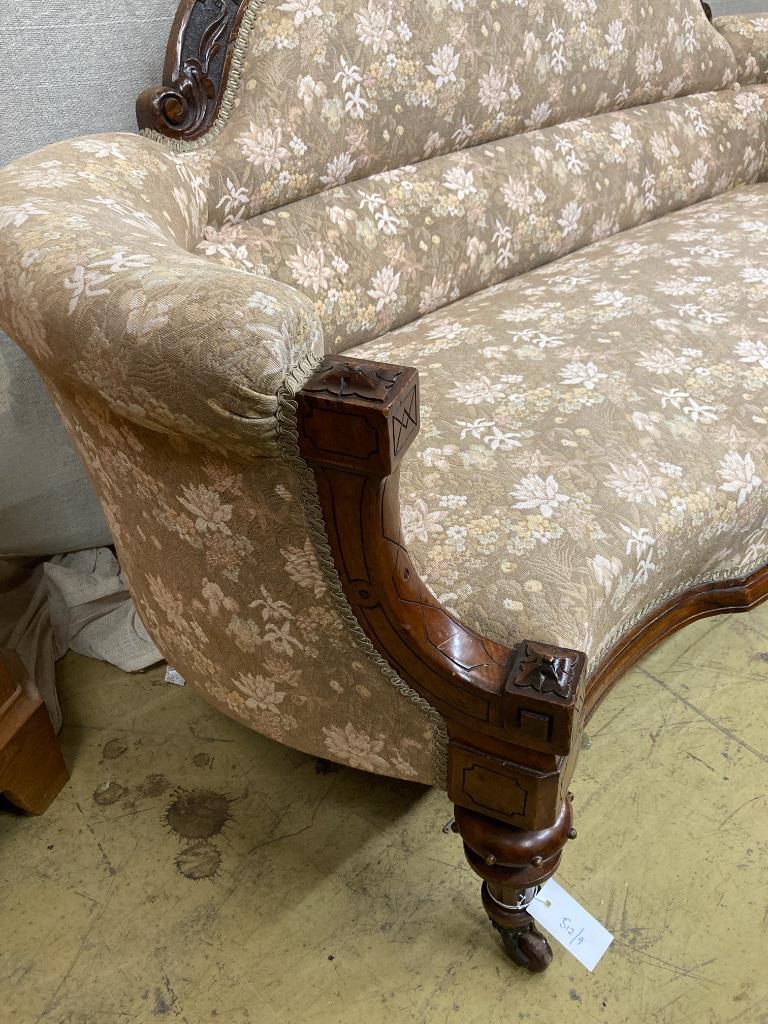 A Victorian walnut sofa, width 166cm, depth 70cm, height 80cm